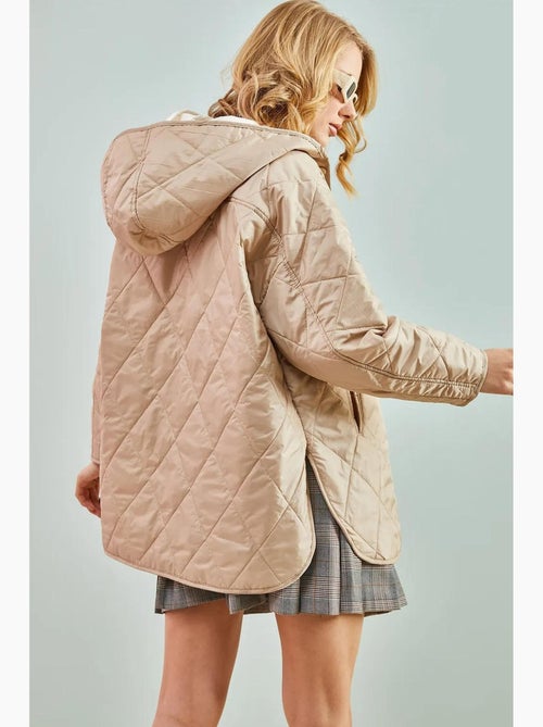 Giacca trapuntata oversize con cappuccio lucci - Kiabi Giacca trapuntata oversize con cappuccio lucci - Kiabi