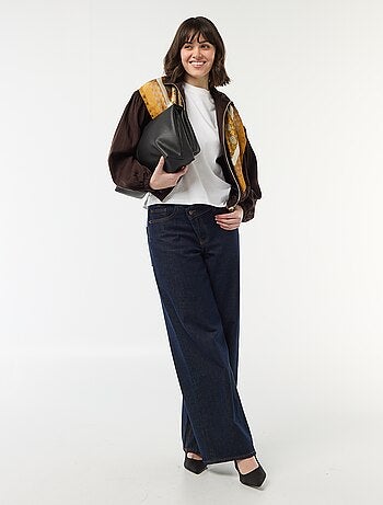 Giacca unita con zip e maniche a sbuffo