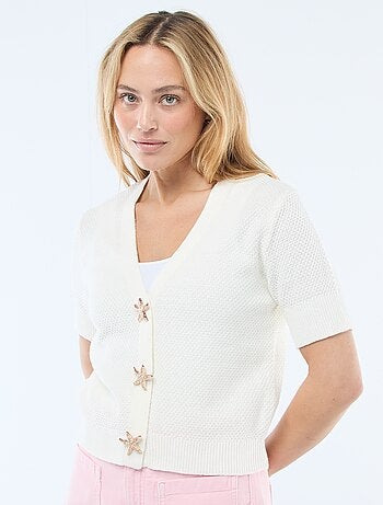 Gilet a maniche corte con bottoni fantasia