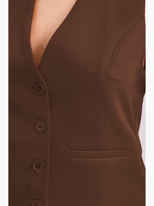 Gilet aderente con bottoni, scollo a v e tasca a filetto bdart - Kiabi Gilet aderente con bottoni, scollo a v e tasca a filetto bdart - Kiabi