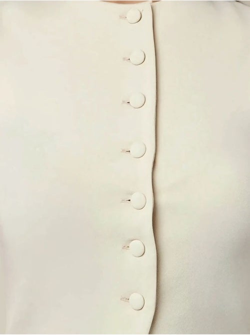 Gilet aderente con scollo rotondo e bottoni hiccup - Kiabi Gilet aderente con scollo rotondo e bottoni hiccup - Kiabi