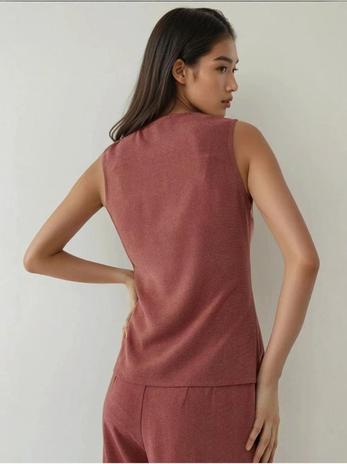 Gilet aderente con scollo rotondo testurizzato e bottoni - Kiabi Gilet aderente con scollo rotondo testurizzato e bottoni - Kiabi
