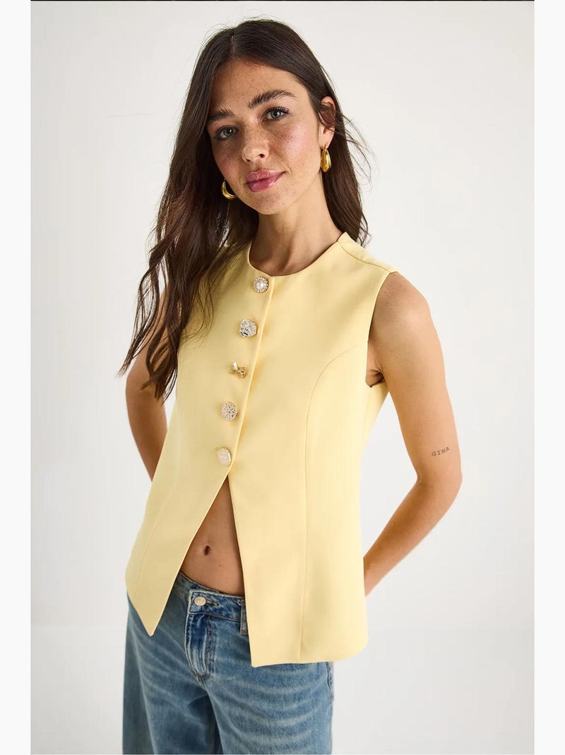 Gilet aderente senza maniche con bottoni sul davanti e scollo girocollo lucci Giallo limone - Kiabi