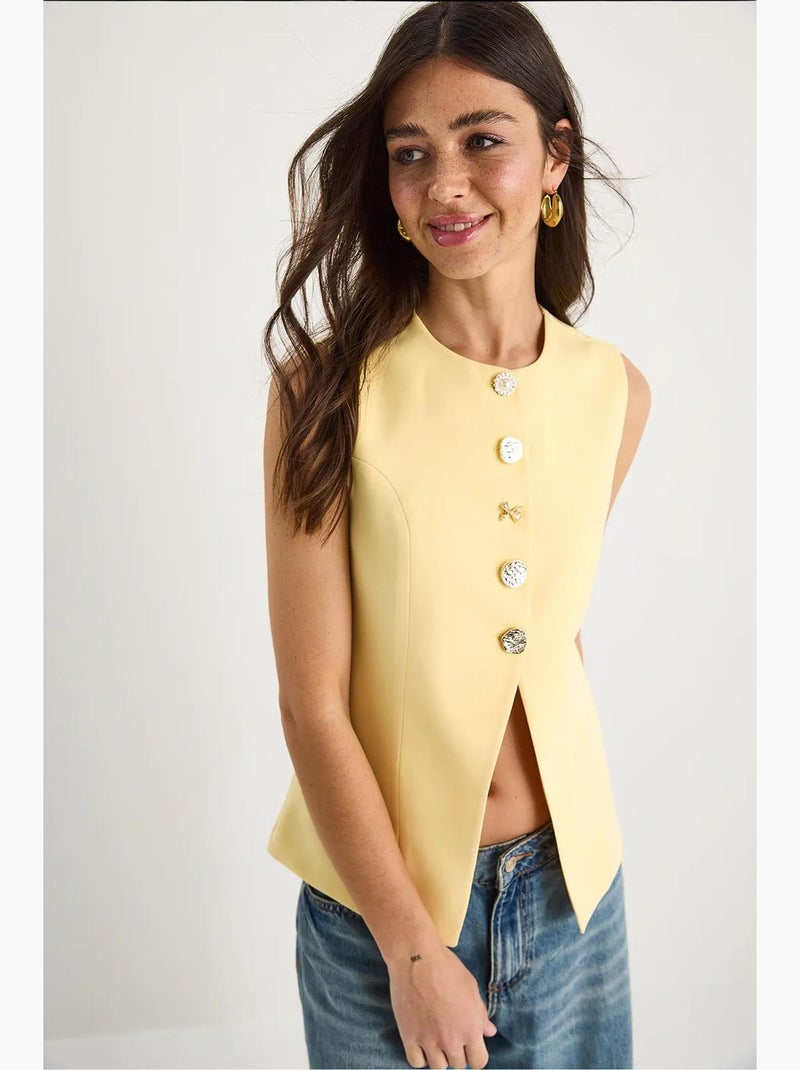 Gilet aderente senza maniche con bottoni sul davanti e scollo girocollo lucci Giallo limone - Kiabi