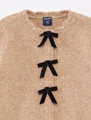 Gilet con apertura a fiocchi