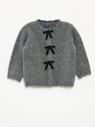 Gilet con apertura a fiocchi