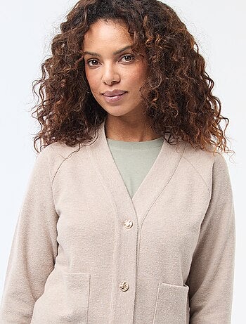 Gilet con apertura abbottonata dorata