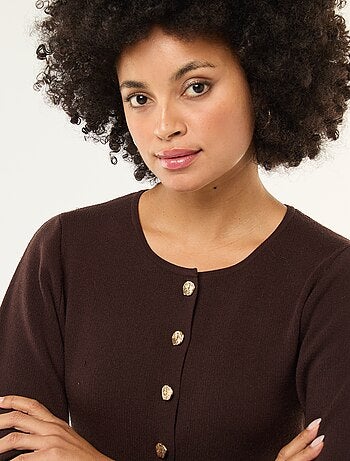 Gilet con bottoni dorati