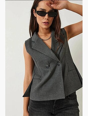 Gilet con collo a scialle e taglio asimmetrico lucci