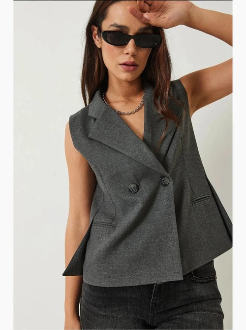 Gilet con collo a scialle e taglio asimmetrico lucci - Kiabi Gilet con collo a scialle e taglio asimmetrico lucci - Kiabi