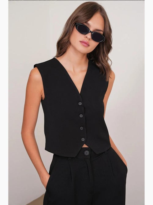 Gilet con scollo a v e bottoni mixray - Kiabi Gilet con scollo a v e bottoni mixray - Kiabi