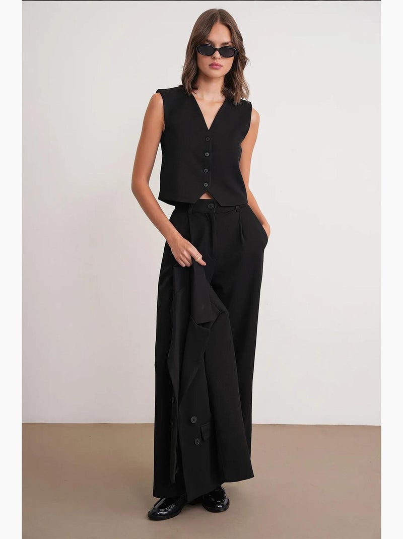 Gilet con scollo a v e bottoni mixray Nero - Kiabi
