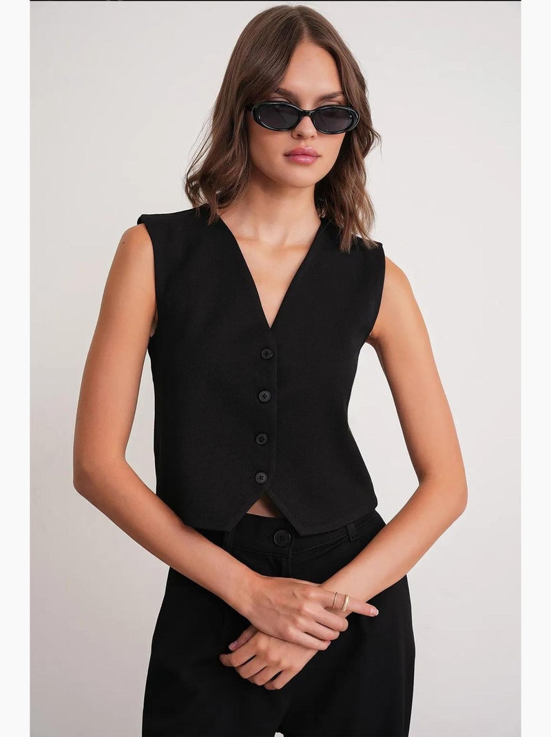 Gilet con scollo a v e bottoni mixray Nero - Kiabi