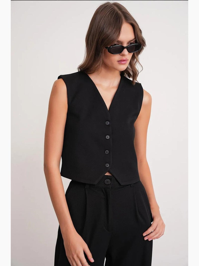 Gilet con scollo a v e bottoni mixray Nero - Kiabi