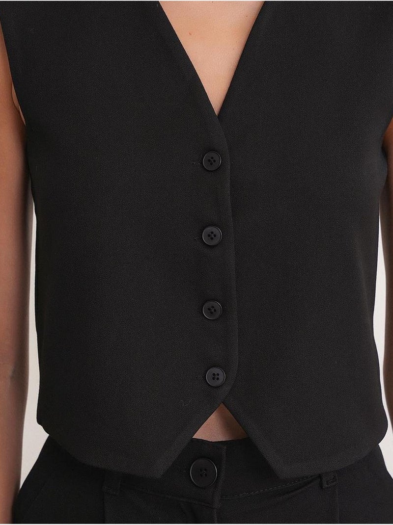 Gilet con scollo a v e bottoni mixray Nero - Kiabi