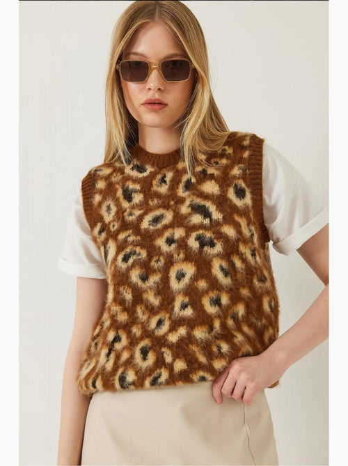 Gilet con stampa leopardata spazzolata lucci - Kiabi Gilet con stampa leopardata spazzolata lucci - Kiabi