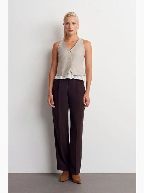 Gilet corto a righe dilvin - Kiabi Gilet corto a righe dilvin - Kiabi