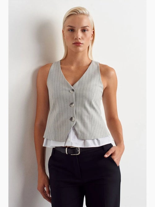 Gilet corto a righe dilvin - Kiabi Gilet corto a righe dilvin - Kiabi