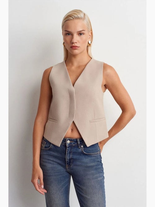 Gilet corto con bottoni dilvin - Kiabi Gilet corto con bottoni dilvin - Kiabi