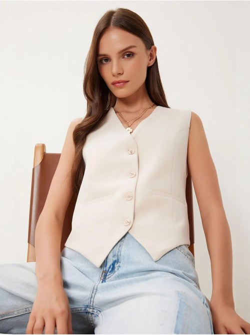 Gilet corto con bottoni istanbul - Kiabi Gilet corto con bottoni istanbul - Kiabi