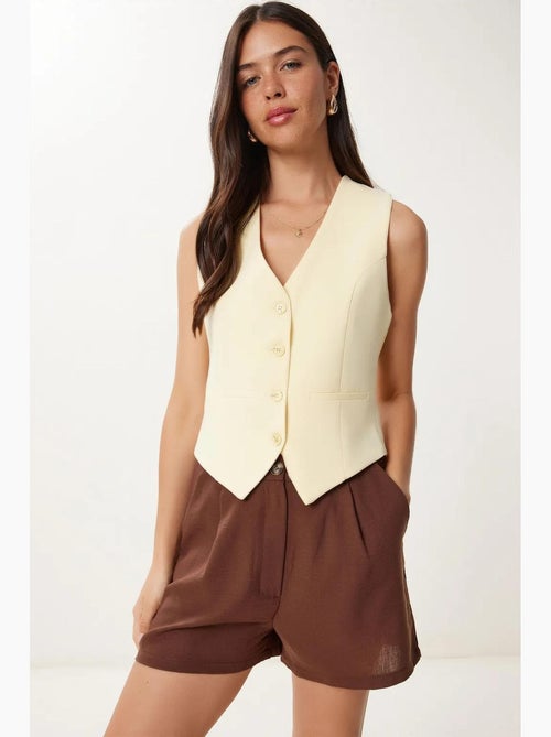 Gilet corto con bottoni istanbul - Kiabi Gilet corto con bottoni istanbul - Kiabi