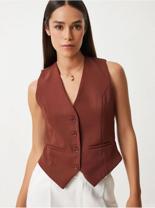 Gilet corto con bottoni istanbul - Kiabi Gilet corto con bottoni istanbul - Kiabi
