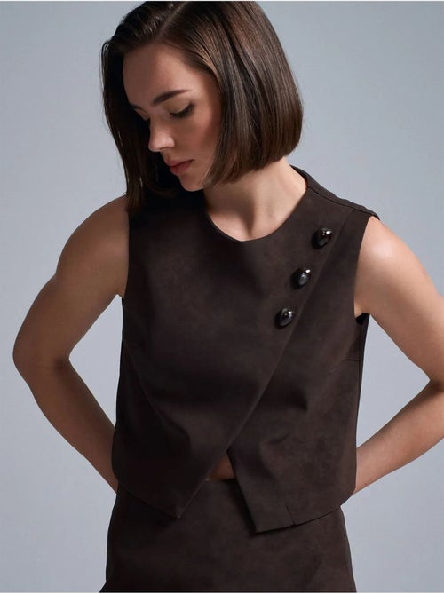 Gilet corto in ecopelle con bottoni dilvin - Kiabi Gilet corto in ecopelle con bottoni dilvin - Kiabi
