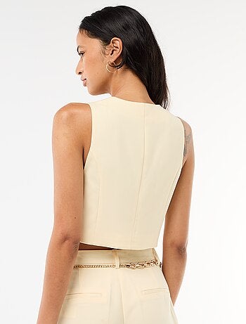 Gilet da abito con apertura asimmetrica abbottonata