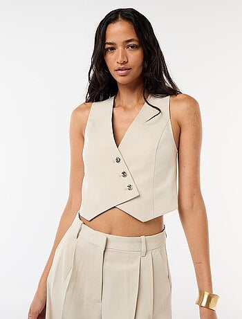 Gilet da abito con apertura asimmetrica abbottonata