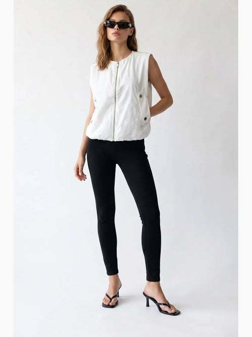 Gilet da donna in popeline tessuto con zip frontale mixray - Kiabi Gilet da donna in popeline tessuto con zip frontale mixray - Kiabi