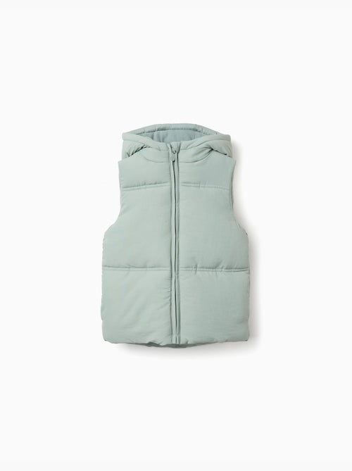 Gilet imbottito con cappuccio e fodera in pile - Kiabi Gilet imbottito con cappuccio e fodera in pile - Kiabi