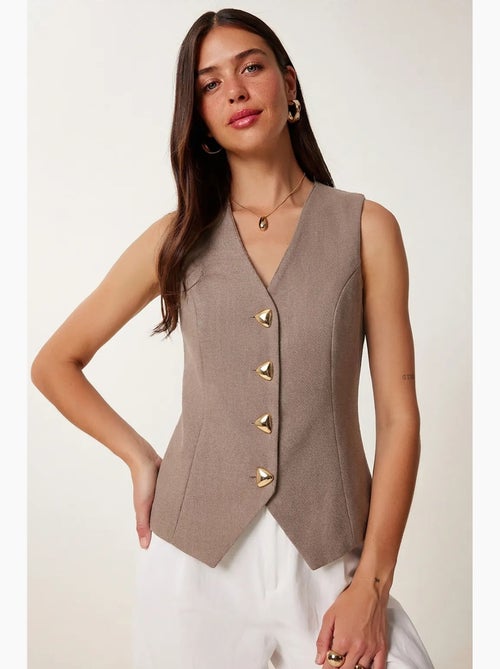 Gilet in crêpe aderente con bottoni istanbul - Kiabi Gilet in crêpe aderente con bottoni istanbul - Kiabi