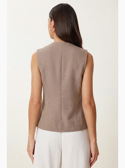 Gilet in crêpe aderente con bottoni istanbul - Kiabi Gilet in crêpe aderente con bottoni istanbul - Kiabi