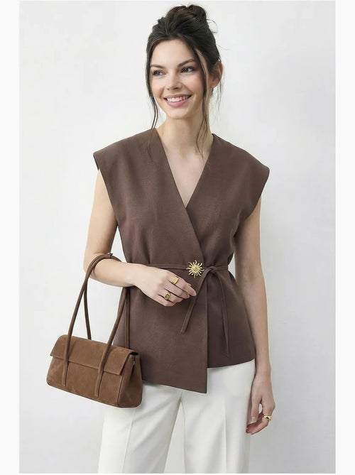 Gilet in crêpe con scollo a v e cintura lucci - Kiabi Gilet in crêpe con scollo a v e cintura lucci - Kiabi