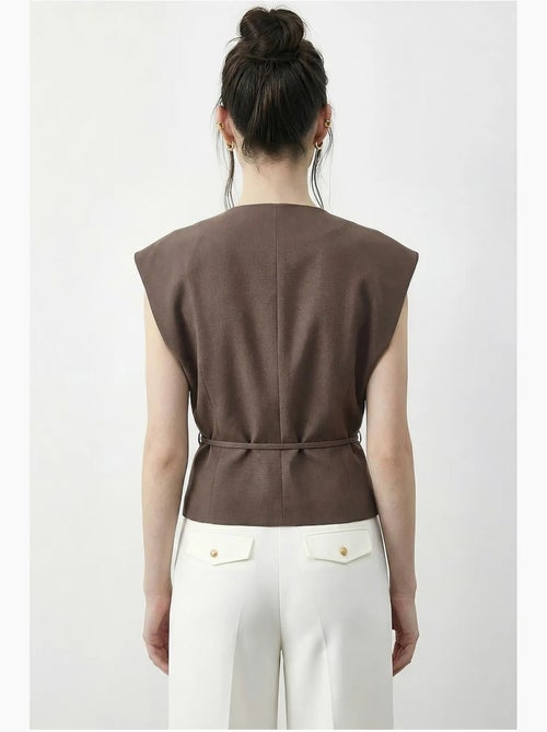 Gilet in crêpe con scollo a v e cintura lucci - Kiabi Gilet in crêpe con scollo a v e cintura lucci - Kiabi