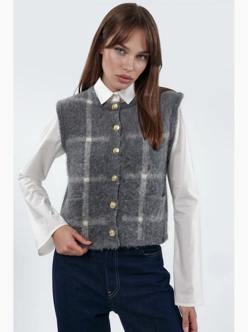 Gilet in maglia a quadri con girocollo e bottoni hiccup - Kiabi Gilet in maglia a quadri con girocollo e bottoni hiccup - Kiabi