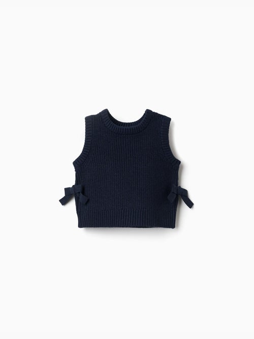 Gilet in maglia con fiocchi laterali - Kiabi Gilet in maglia con fiocchi laterali - Kiabi