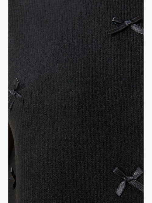 Gilet in maglia testurizzata con dettaglio fiocco istanbul - Kiabi Gilet in maglia testurizzata con dettaglio fiocco istanbul - Kiabi