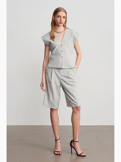 Gilet in tessuto con scollo a v a righe dilvin - Kiabi Gilet in tessuto con scollo a v a righe dilvin - Kiabi
