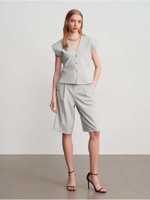 Gilet in tessuto con scollo a V a righe - Kiabi Gilet in tessuto con scollo a V a righe - Kiabi