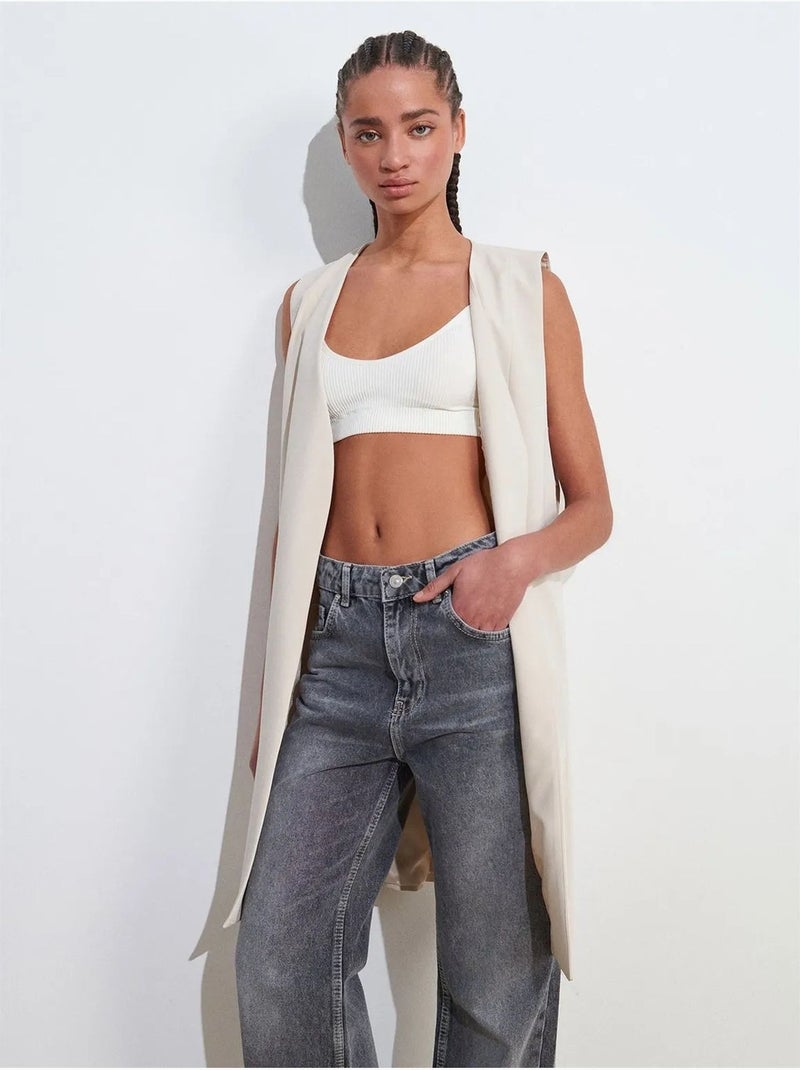 Gilet lungo in crêpe tessuto con dettaglio cut-out dilvin Crema - Kiabi