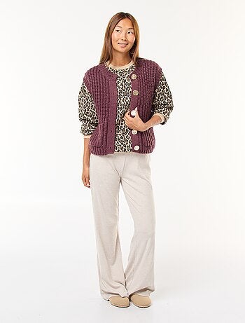 Gilet smanicato con apertura abbottonata