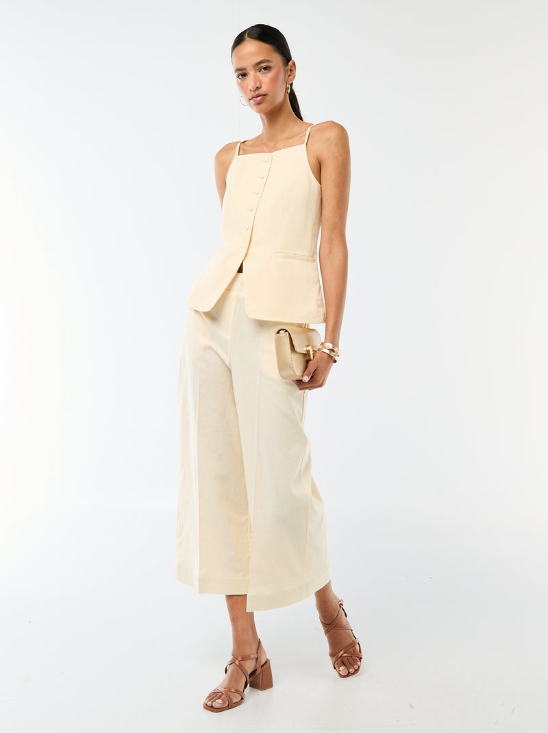 Gilet smanicato con bretelle Beige - Kiabi