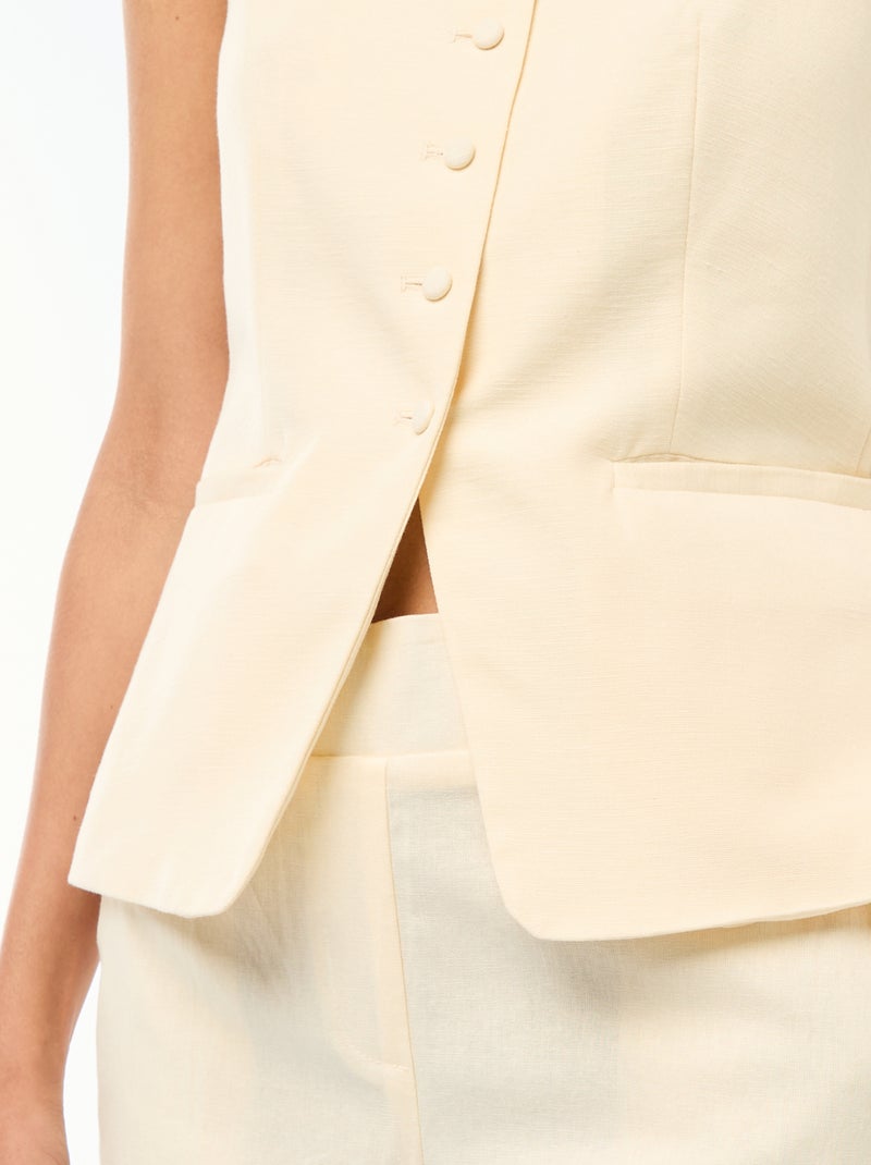 Gilet smanicato con bretelle Beige - Kiabi