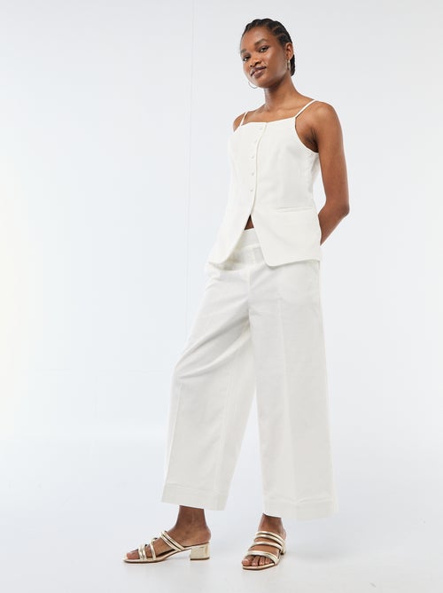 Gilet smanicato con bretelle - Kiabi