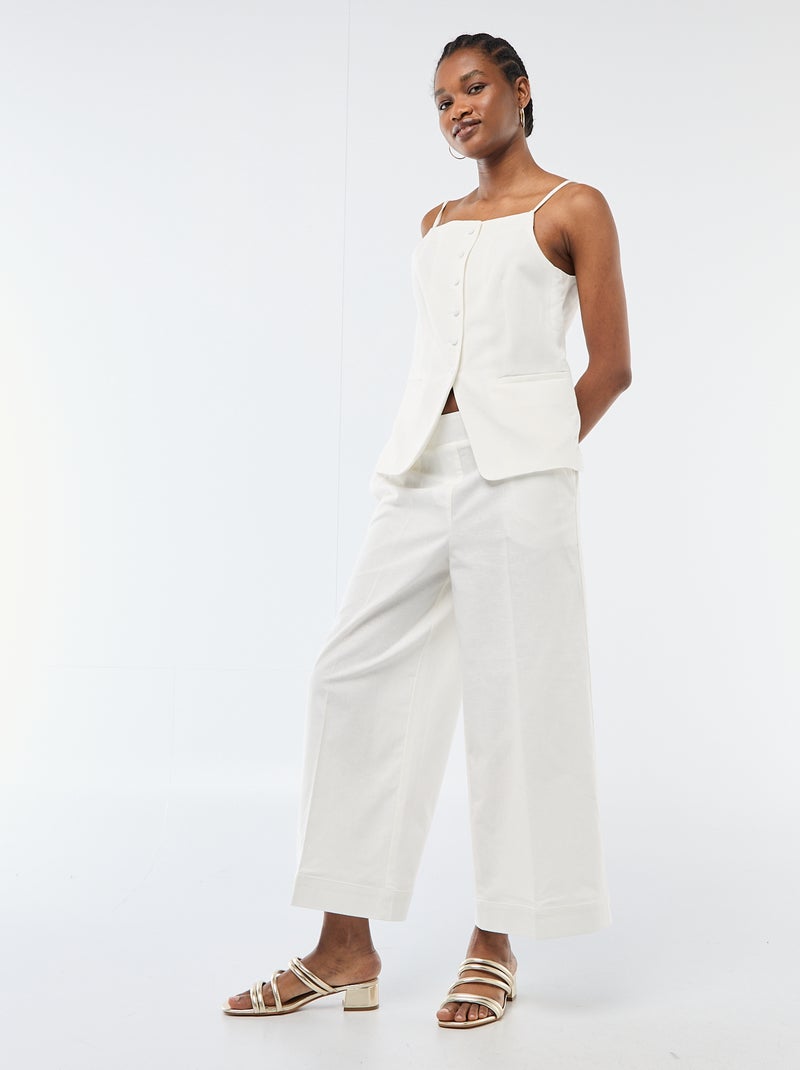 Gilet smanicato con bretelle Bianco - Kiabi