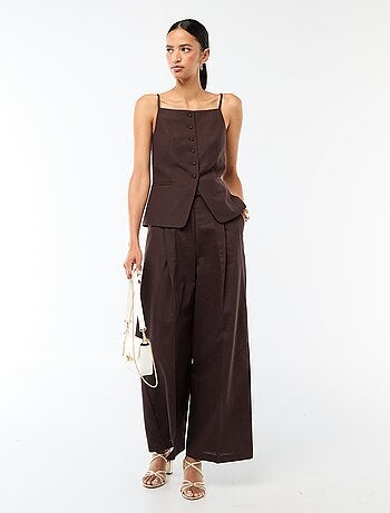 Gilet smanicato con bretelle