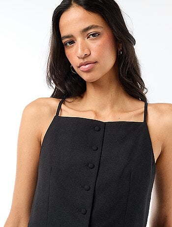 Gilet smanicato con bretelle