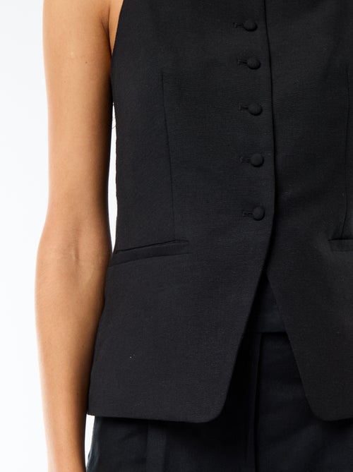 Gilet smanicato con bretelle - Kiabi