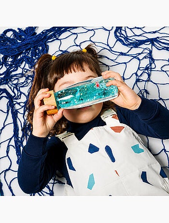 Giocattolo bottiglia sensoriale move per bambino | Petit Boum